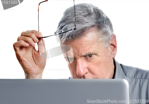 Image of 	senior using laptop