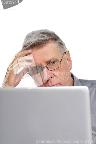 Image of senior using laptop