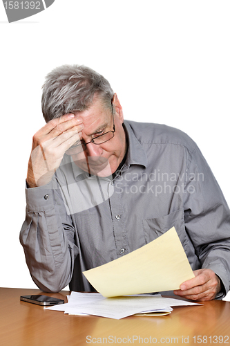 Image of Senior man with papers 