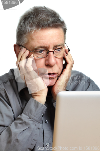 Image of senior using laptop