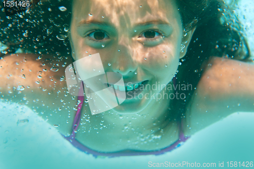 Image of underwater girl in swimming pool 