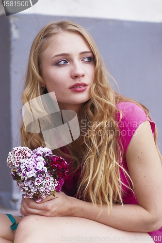 Image of Waiting girl with bouquet