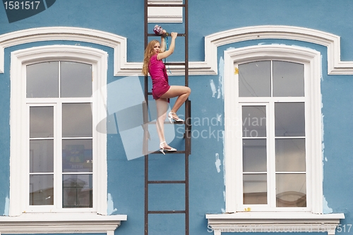 Image of Young woman on stair