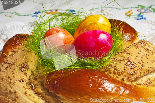 Image of easter bread with painted eggs