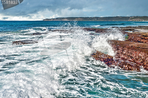 Image of waves on rocks at the coast