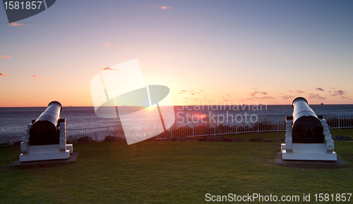 Image of ocean sunrise and cannons at wollongong