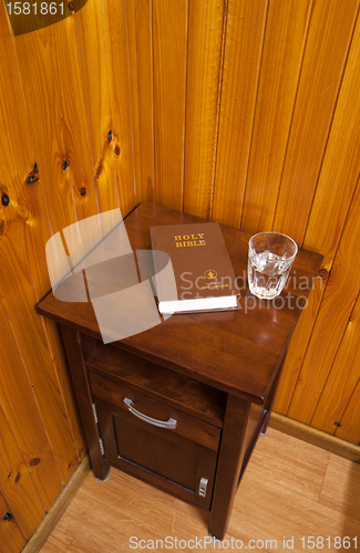 Image of bible on bed side table