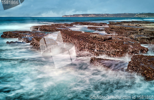 Image of waves on rocks at the coast