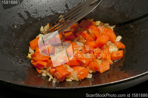 Image of chinese wok with carrots