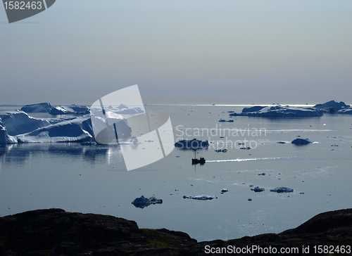 Image of Fishing boat in Ilulissat Icefjord, Greenland.