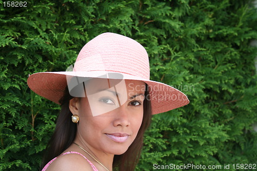 Image of Beauty in pink hat