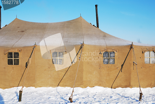 Image of military tent with frozen windows 