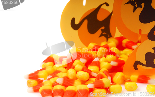 Image of Halloween candy corn spilling out of a box