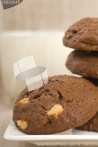 Image of Triple chocolate chip cookies with milk