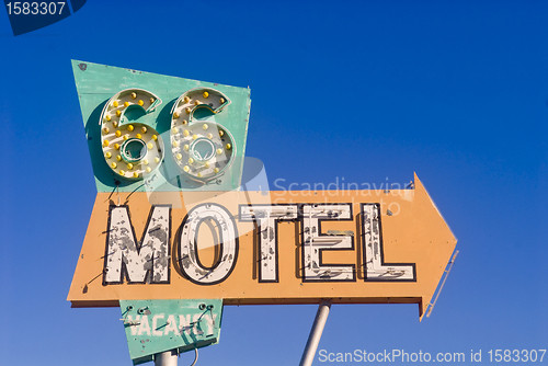 Image of Route 66 motel sign from an abandoned motel