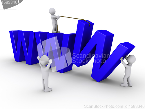 Image of Three people work to set up a website