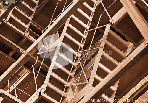 Image of Interlocking rusty industrial constructions