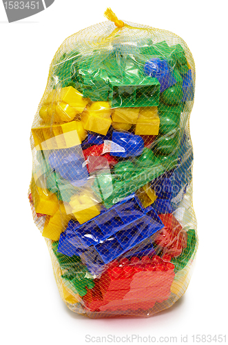 Image of New plastic toy blocks in the bag