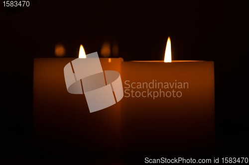 Image of candles in the dark