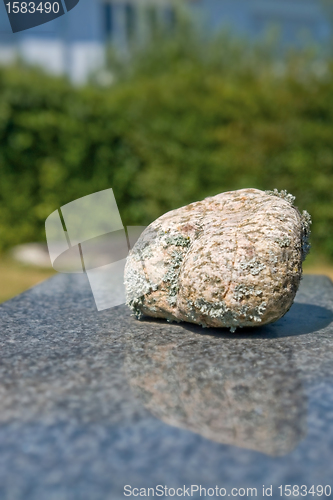 Image of pebble on stone