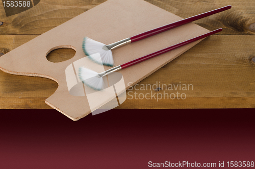 Image of Painting brushes and art pallete