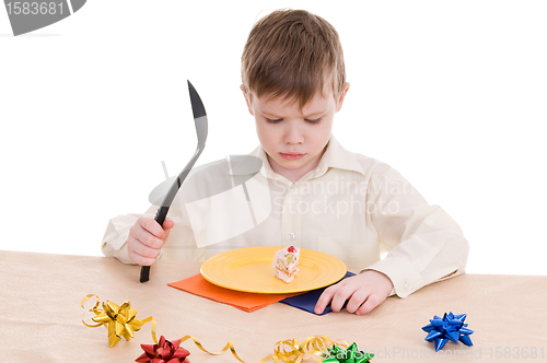 Image of child with cake