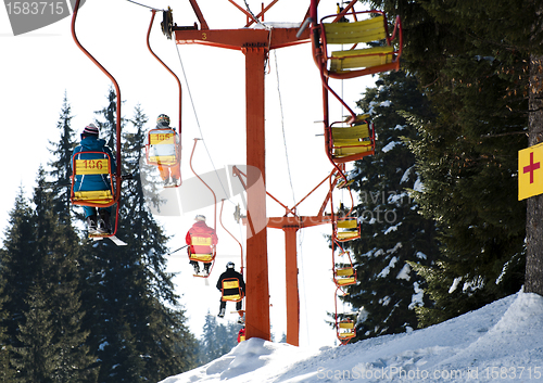 Image of Ski lift and skiers