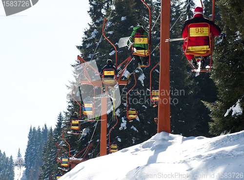 Image of Ski lift and skiers