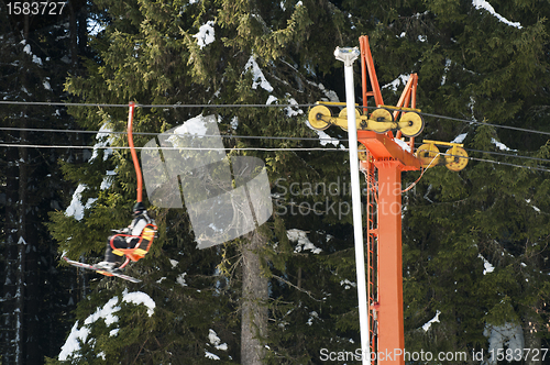 Image of Ski lift and skiers