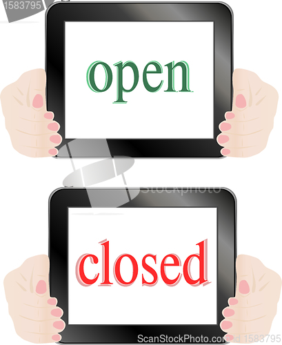 Image of Hands holding touch screen tablet pc with business concept