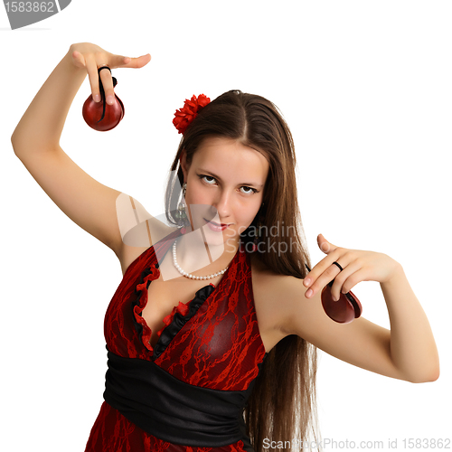 Image of Young beautiful girl with castanets - dancer
