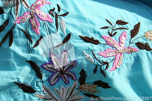 Image of Wonderful embroideries on this material for skirts made in the Philippines