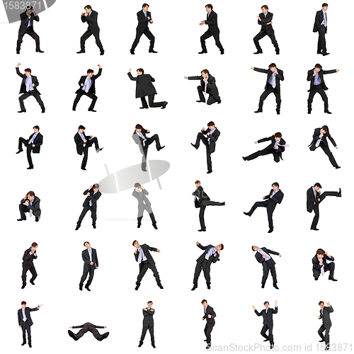 Image of Set of fighting businessmen on white