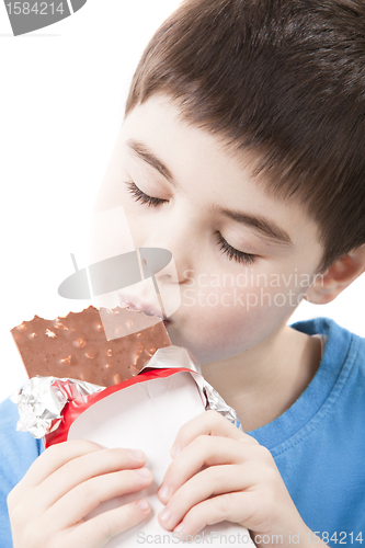 Image of Boy with chocolate in the hands 