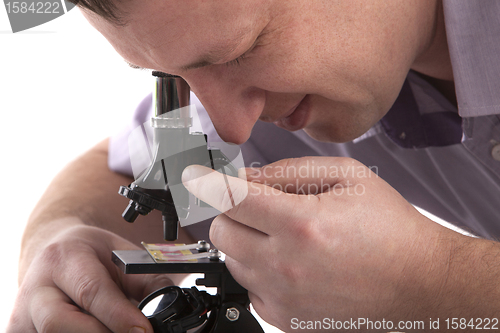Image of Man with a microscope