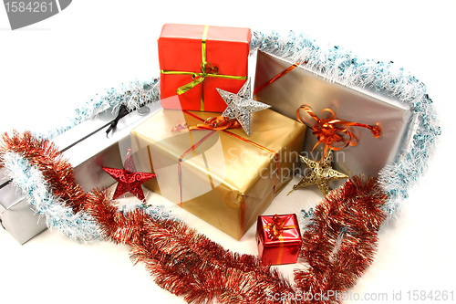 Image of beautiful christmas gifts on white background