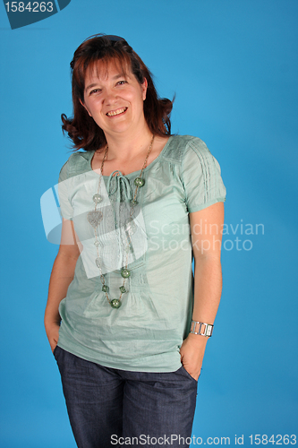 Image of fashion woman on blue background studio shot