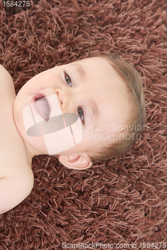 Image of happy baby boy, studio photo session