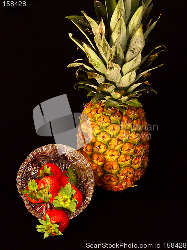 Image of Pineapple and Strawberries on Black