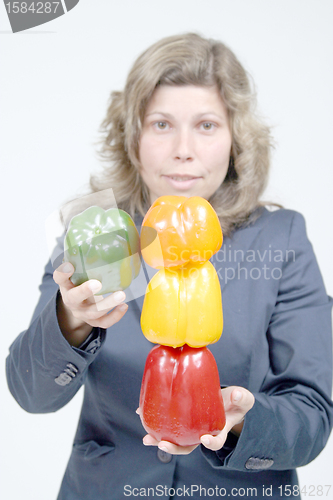 Image of woman with colored peppers, healthy food photo