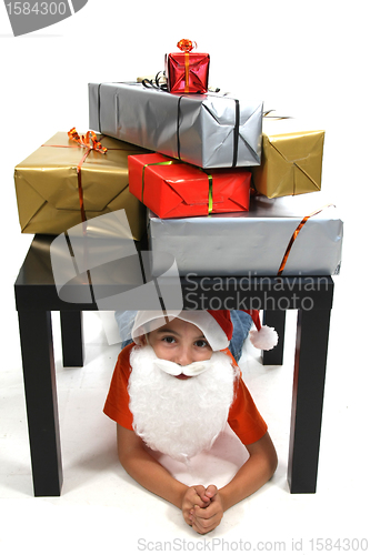 Image of boy with large present at christmas time