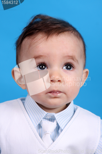 Image of Portrait of a happy baby boy Isolated on blue background