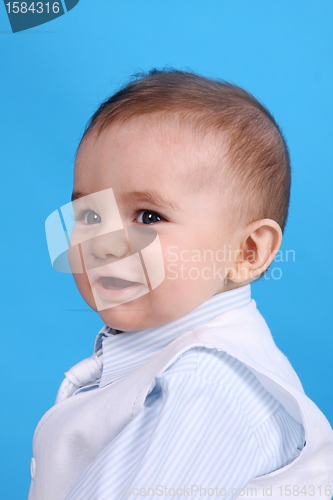 Image of Portrait of a happy baby boy Isolated on blue background