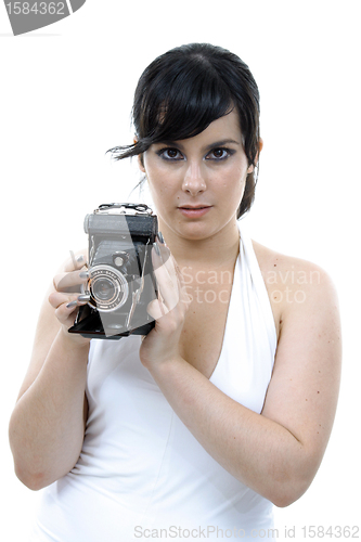 Image of casual young woman photographer