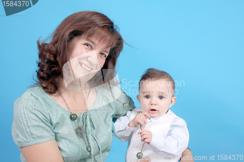 Image of Portrait of a beautiful happy mother with beautiful baby