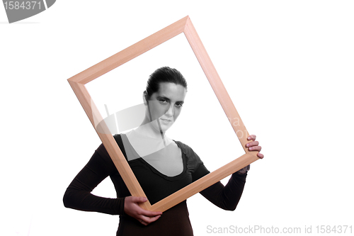 Image of Portrait of a beautiful young woman with frame