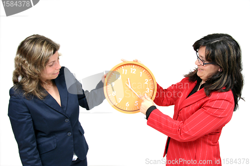 Image of sexy businesswoman with clock, business photo