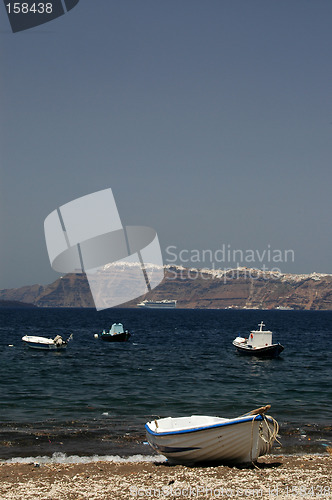 Image of row boat beach santorini