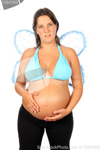 Image of Beautiful pregnant girl with innocent angel wings