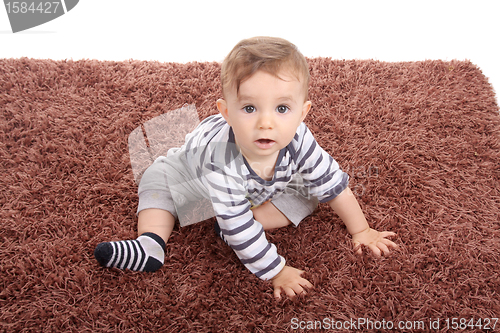 Image of happy baby boy, studio photo session